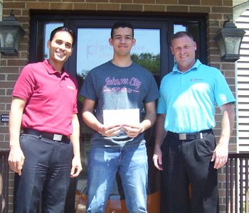 Dionne Hendricks receiving his award