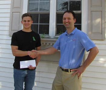 Harley Mullis receiving his award