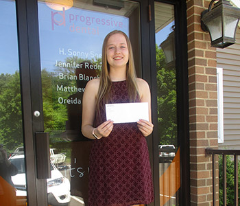 Zoe Murray receiving her award