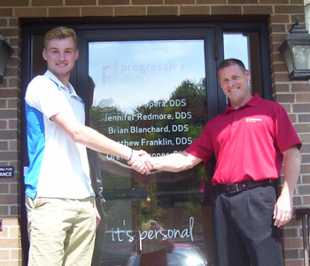 Trevor Brochardt receiving his award