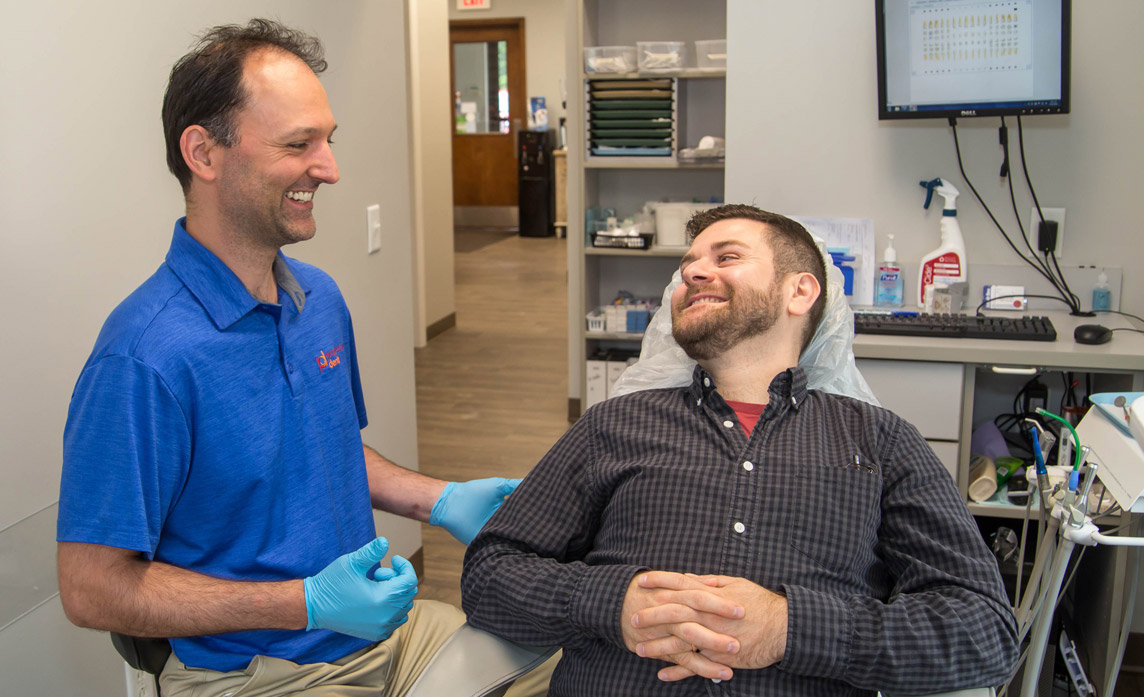 Dr. Franklin and a patient smiling